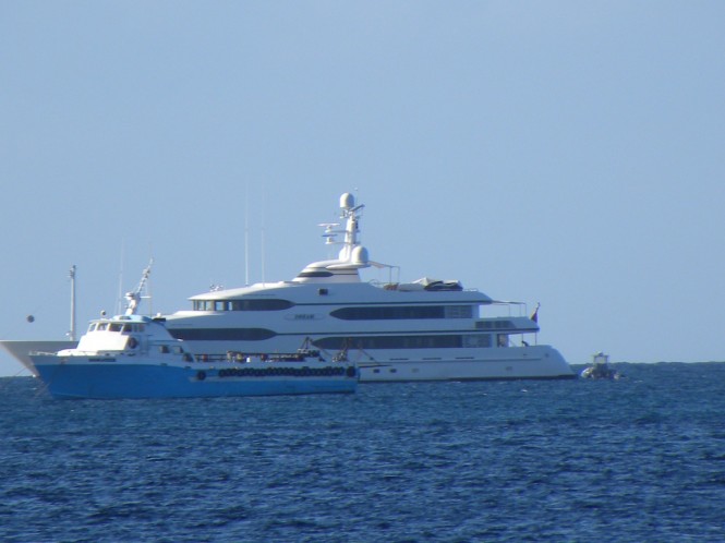 Luxury superyacht Dream - Photo taken from Pinney's Beach on Nevis in the Caribbean by Scott Henderson Luxury superyacht Dream - Photo taken from Pinney's Beach on Nevis in the Caribbean by Scott Henderson