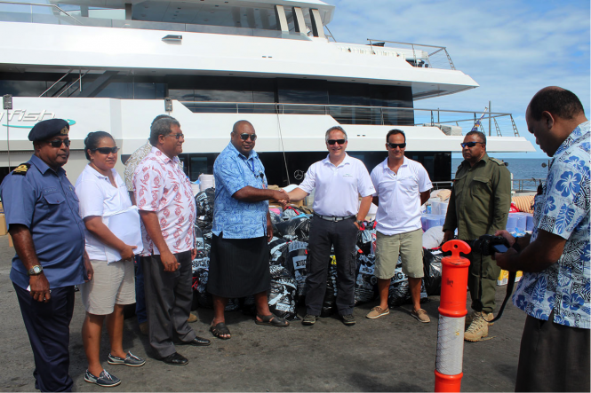 Relief supplies arrive in Fiji aboard luxury expedition yacht BIG FISH