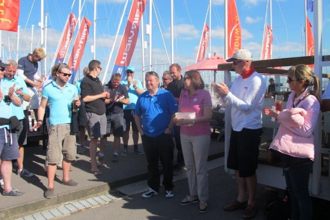 2013 ISS Regatta Kerry Pettitt with Lizette van Niekerk being recognised for MTN's generosity and drawing the first Raffle ticket 2013 ISS Regatta Kerry Pettitt with Lizette van Niekerk being recognised for MTN's generosity and drawing the first Raffle ticket