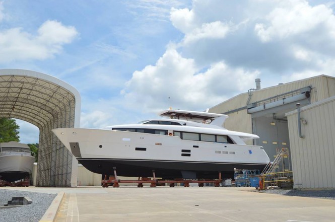 Hatteras 100RPH Yacht leaving her shed