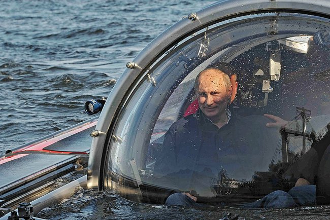 Vladimir Putin in the C-Explorer 5 mini-submarine Vladimir Putin in the C-Explorer 5 mini-submarine