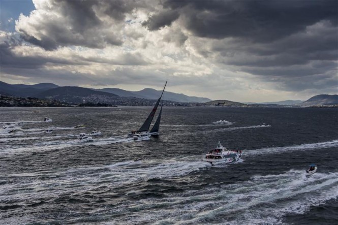 Sailing yacht Wild Oats XI takes line honours win at 2013 Rolex Sydney Hobart Race