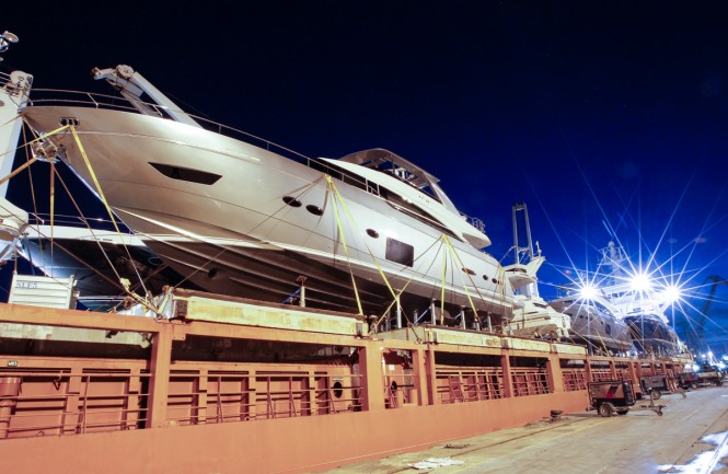 Princess yachts being loaded on Erasmusgracht