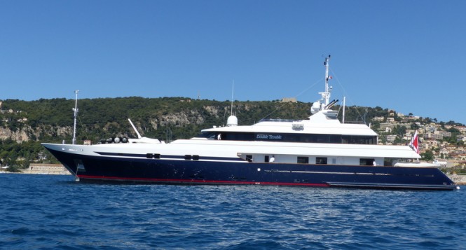 Motor yacht DOUBLE TROUBLE back home following full hull wrap by Wild Group International