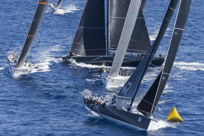 Roberto Tomasini's ROBERTISSIMA III (GBR) leading the Mini Maxi fleet around the windward mark - Photo by Rolex Carlo Borlenghi Roberto Tomasini's ROBERTISSIMA III (GBR) leading the Mini Maxi fleet around the windward mark - Photo by Rolex Carlo Borlenghi