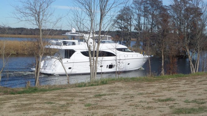 Luxury motor yacht Hatteras 80 MY underway Luxury motor yacht Hatteras 80 MY underway