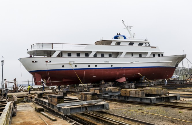 Re-launch of classic superyacht Moon Maiden II during a solar eclipse at Solent Refit