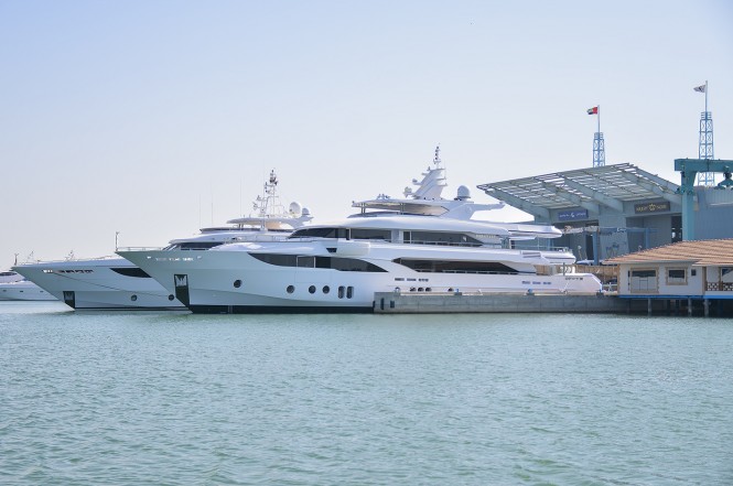 Super yacht Majesty 155 in the water next to Majesty 135 and Majesty 122 yachts