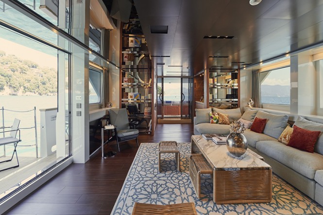 Luxury yacht TAKARA - Main salon with side balcony on left