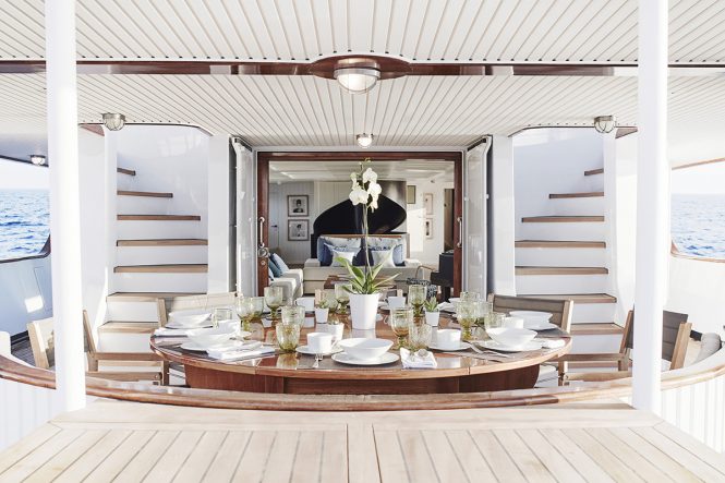 Al fresco dining on the aft deck of classic yacht MENORCA. Photo credit Mare e Terra