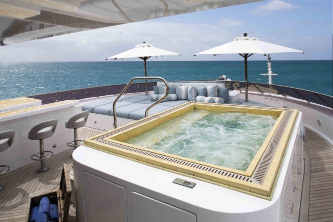 Luxury yacht UNBRIDLED - Sundeck Jacuzzi, sunpads and bar