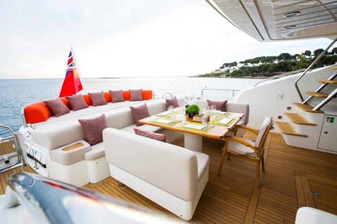 M/Y FIRECRACKER - Main deck aft alfresco dining and sunpads