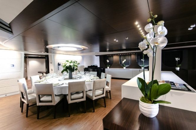 Superyacht KATINA - Formal dining area in the open plan main salon