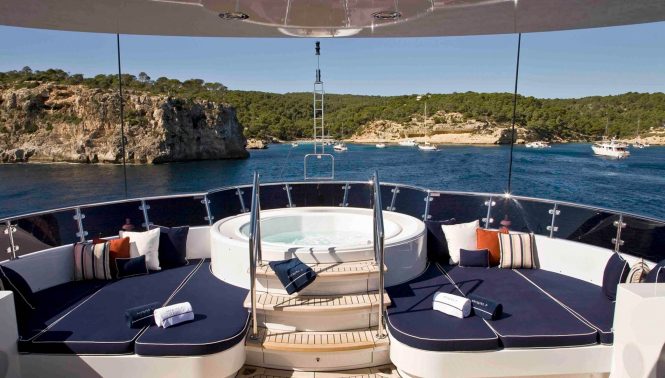 Jacuzzi with large sun pads around