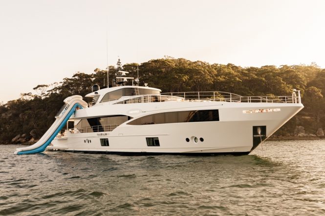 ONEWORLD with a waterslide for unlimited fun on your charter vacation