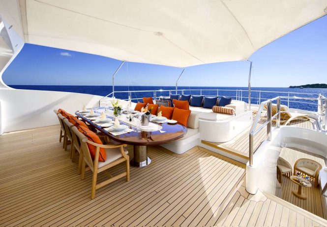Alfresco dining and lounging areas on sun deck
