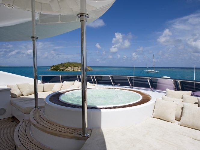 Jacuzzi on board surrounded by sun pads