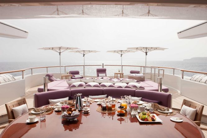 Alfresco dining with seating area on sun deck