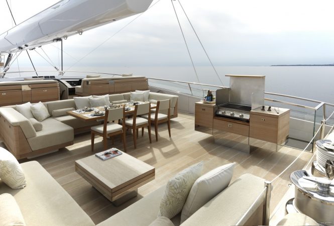 Exterior deck areas with seating and barbecue