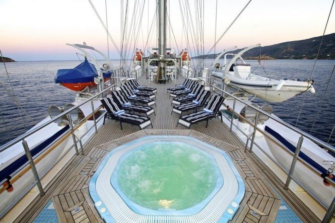 On deck Jacuzzi and sunbathing area