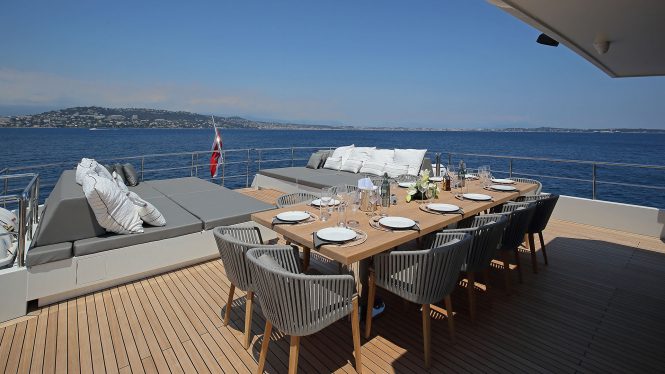 upper deck dining area and sunpads
