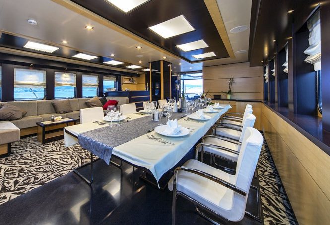 Elegant dining set up in the saloon