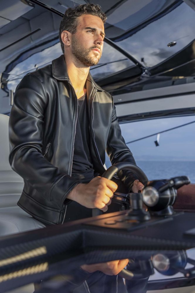 at the helm