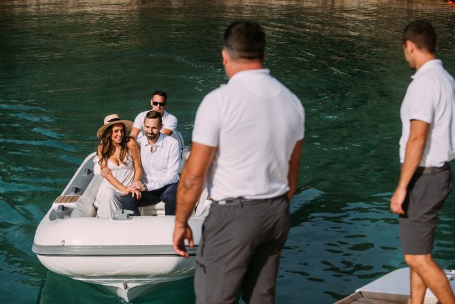 Charter guests arriving to the yacht