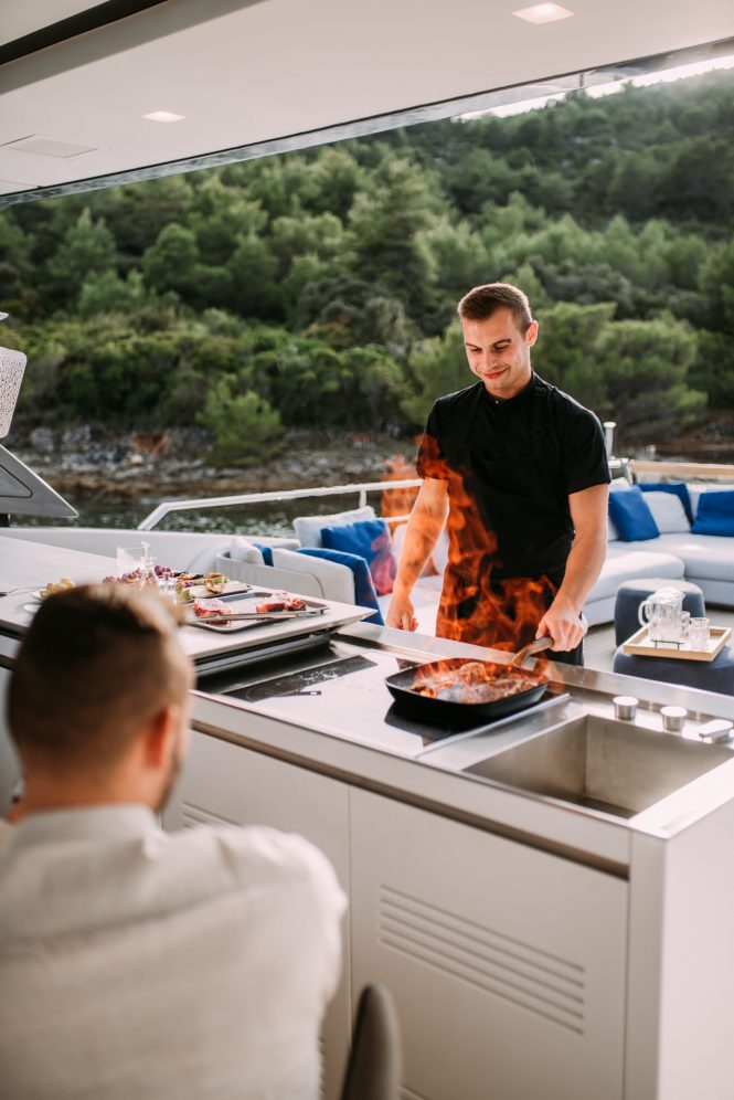 Chef preparing dinner on board