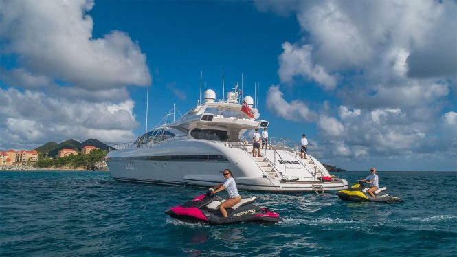 at anchor with jetskis 