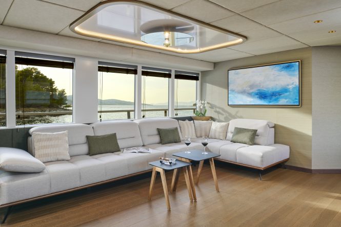 Minimalist and comfortable interiors for a relaxing stay aboard