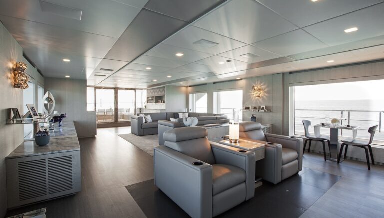 main deck saloon with two armchairs to view movies