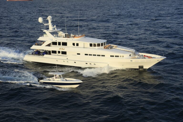 Profile Aspect Including Ship's Tender Aboard Yacht AT LAST