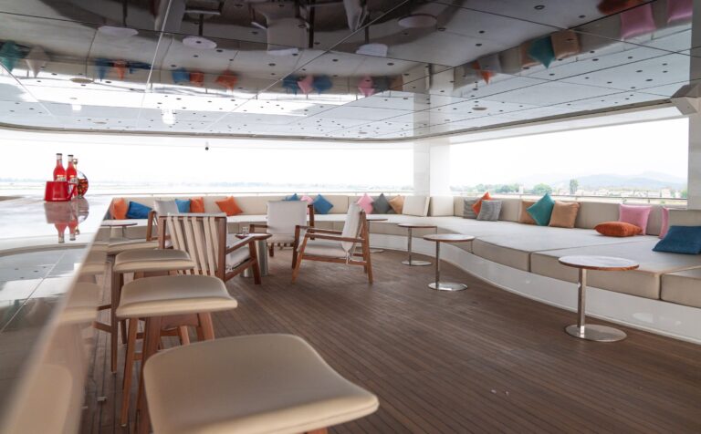 Bar stools and lounge furniture on deck