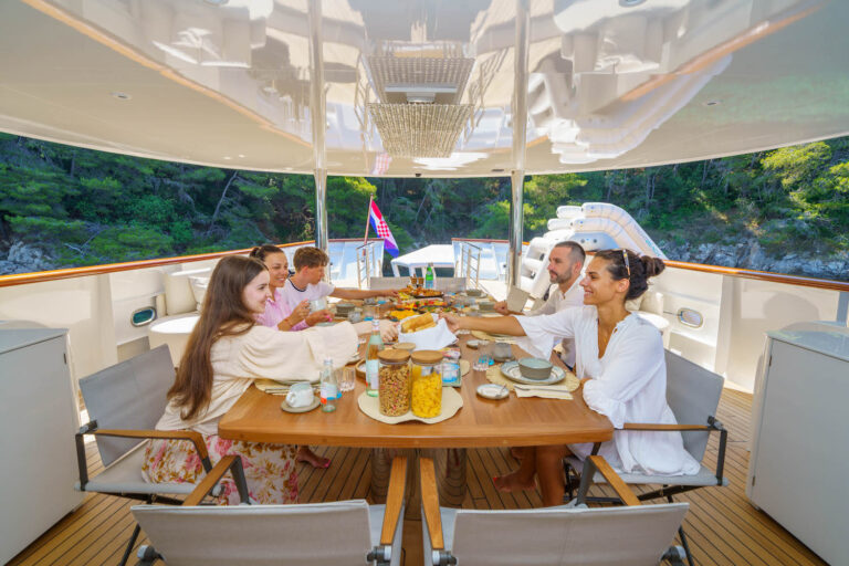 Enjoying A Breakfast On  A Yacht