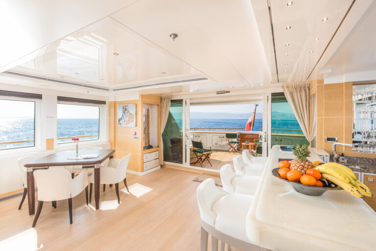 Upper Deck With Bar, Table And Chairs