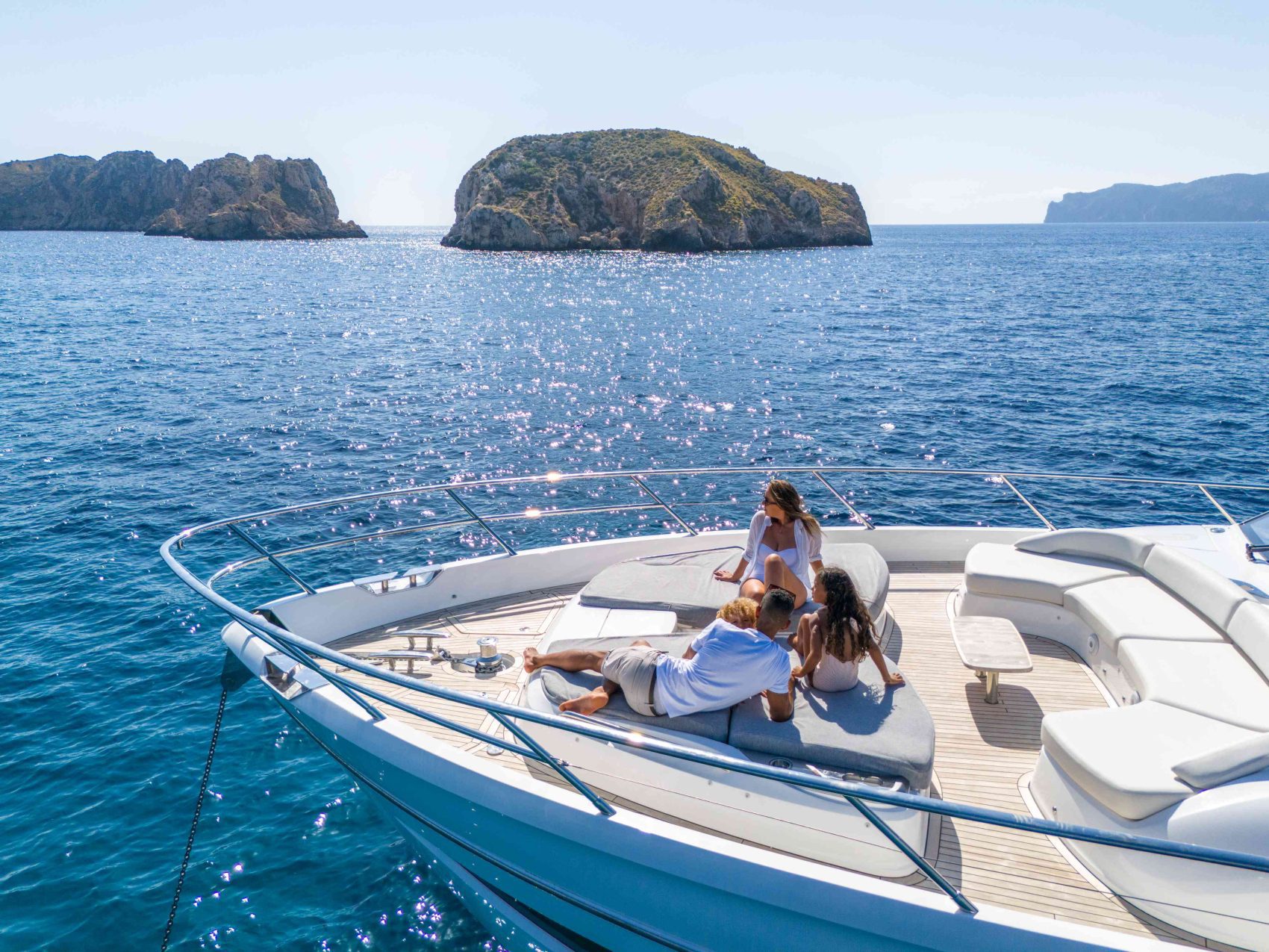 203 Relaxin on the foredeck sun pads.jpg