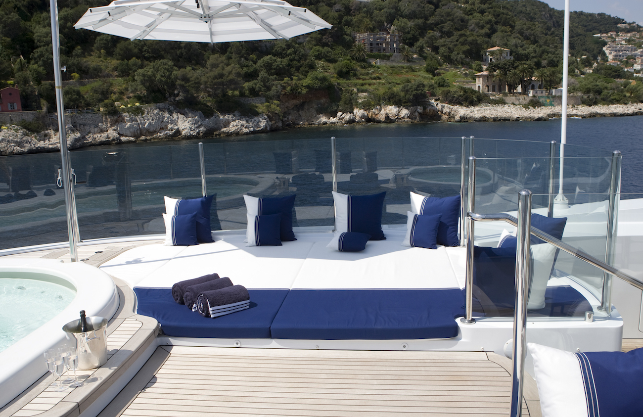 Jacuzzi on sun deck with sun pads and Champagne.jpg