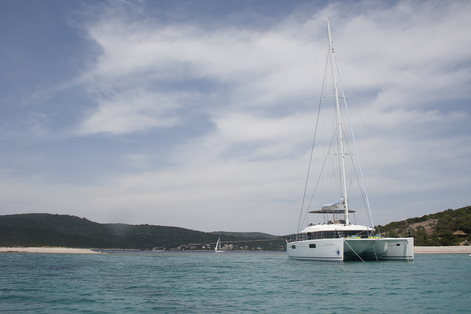 Lagoon sailing yacht EAGLE OF NORWAY - Anchored in a bay.jpg
