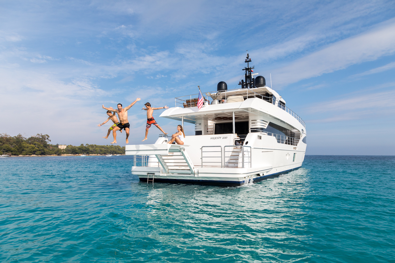 Majesty 100 yacht MIA jumping into water.jpg