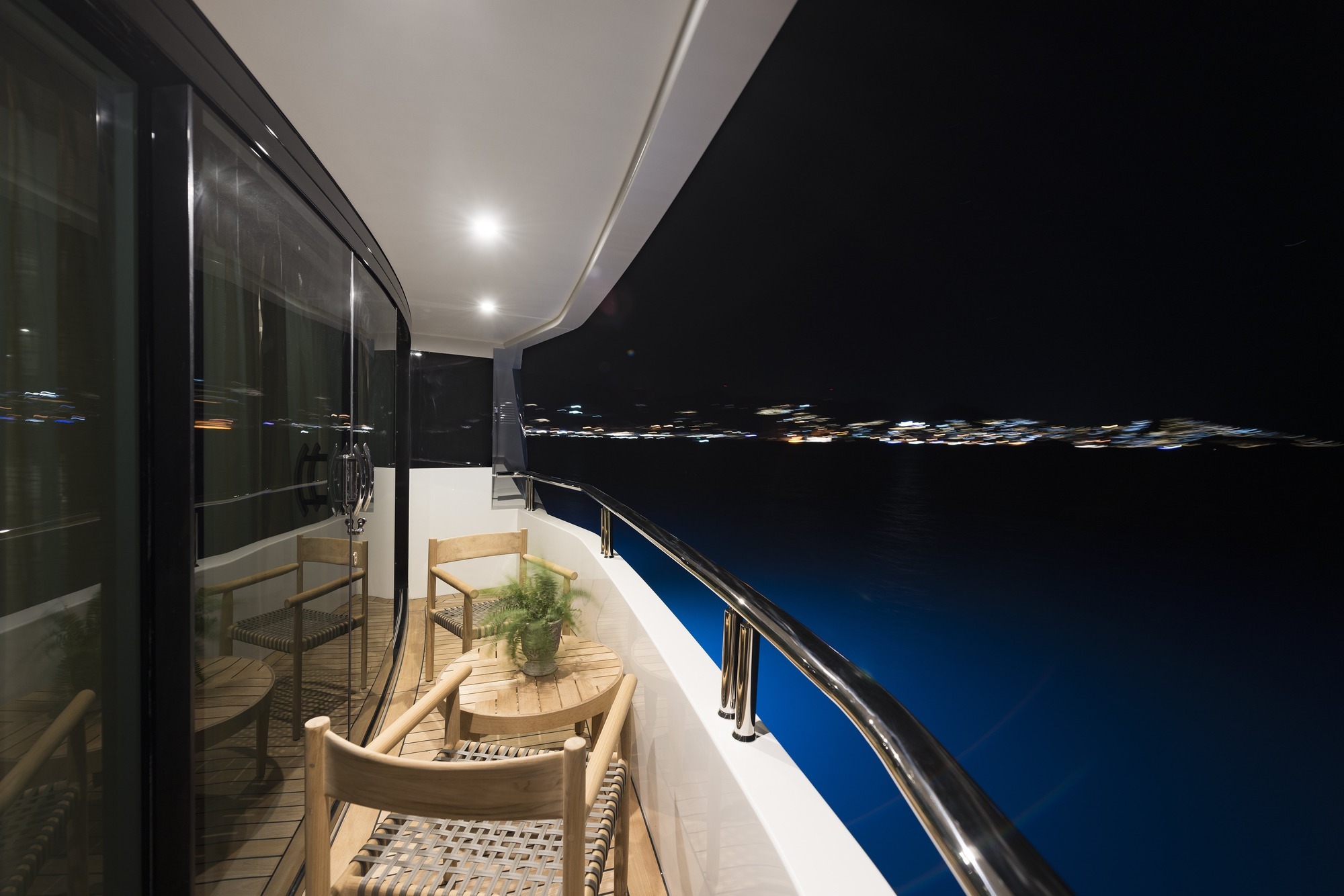Motor Yacht LIQUID SKY by CMB Yachts - balcony evening.jpg