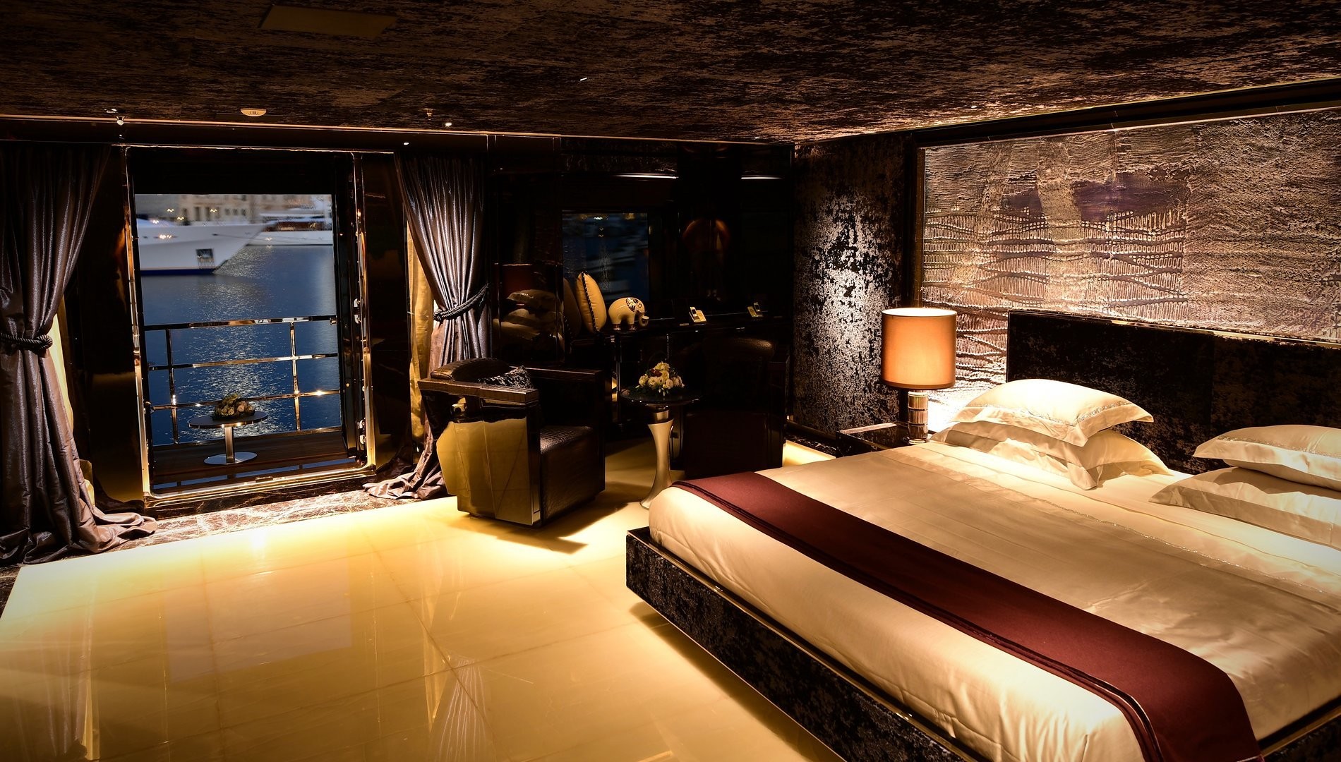 Owner's suite with drop-down port-side balcony.jpg
