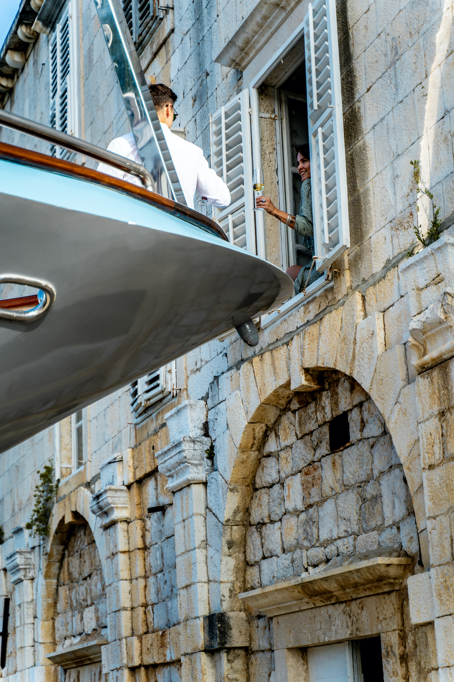 Romantic couple in Croatia yacht and window.jpg
