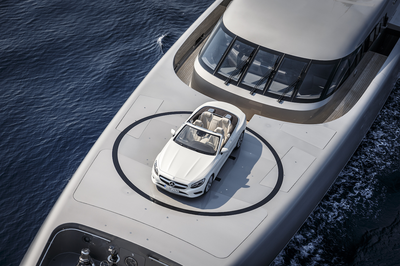 Superyacht with Mercedes S-Class Convertible car on board.jpg