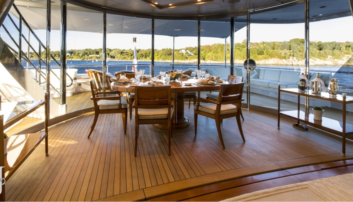 aft deck dining with glazed doors.png