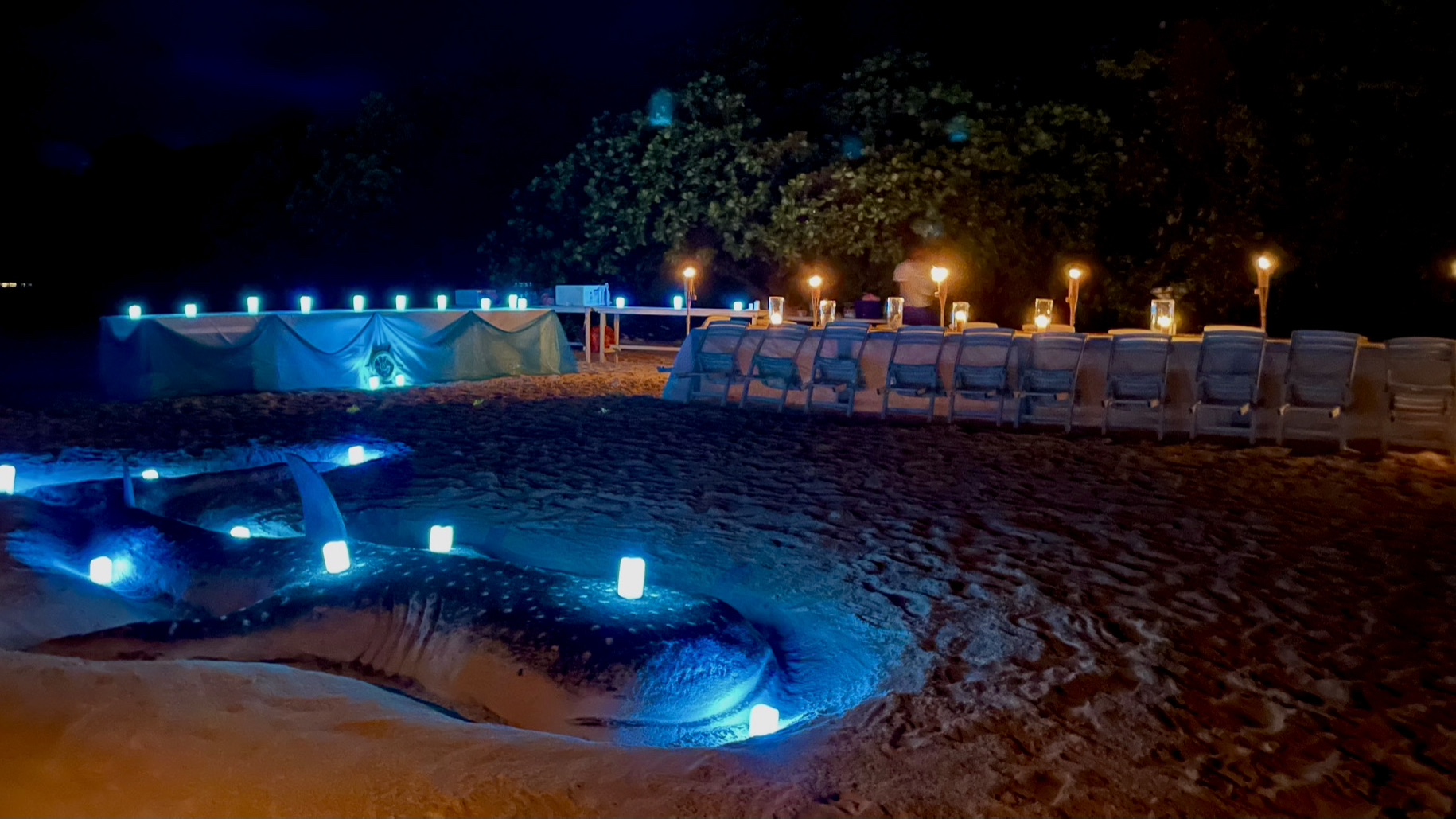 amazing sand art created by the crew of SAFIRA for an evening beach set up and dinner.jpg