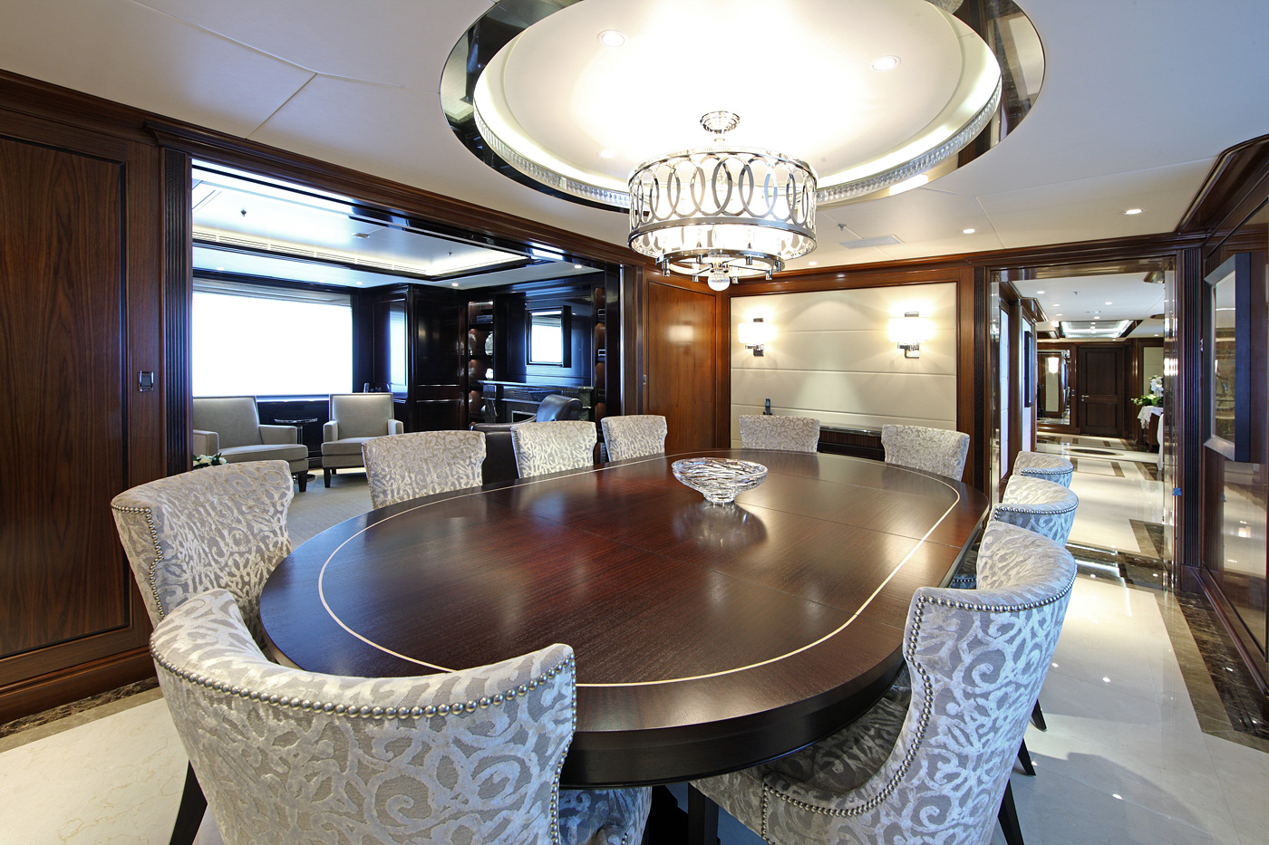 elegant dining area with large table and plush seating.jpg