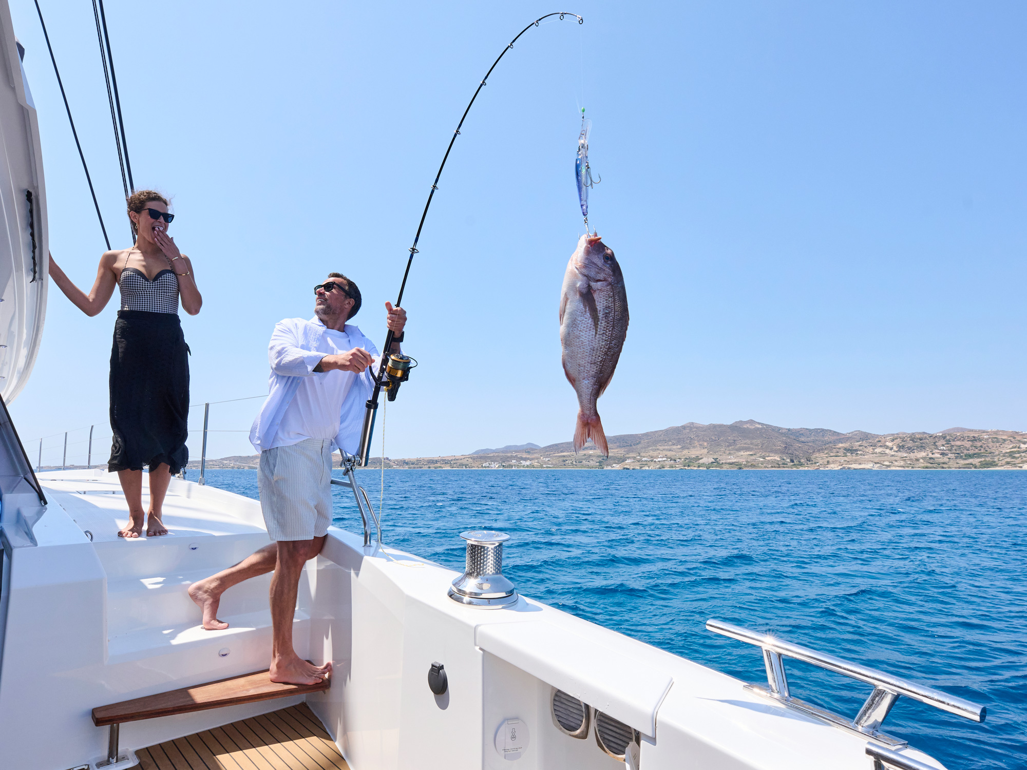 fishing on a catamaran yacht.jpg