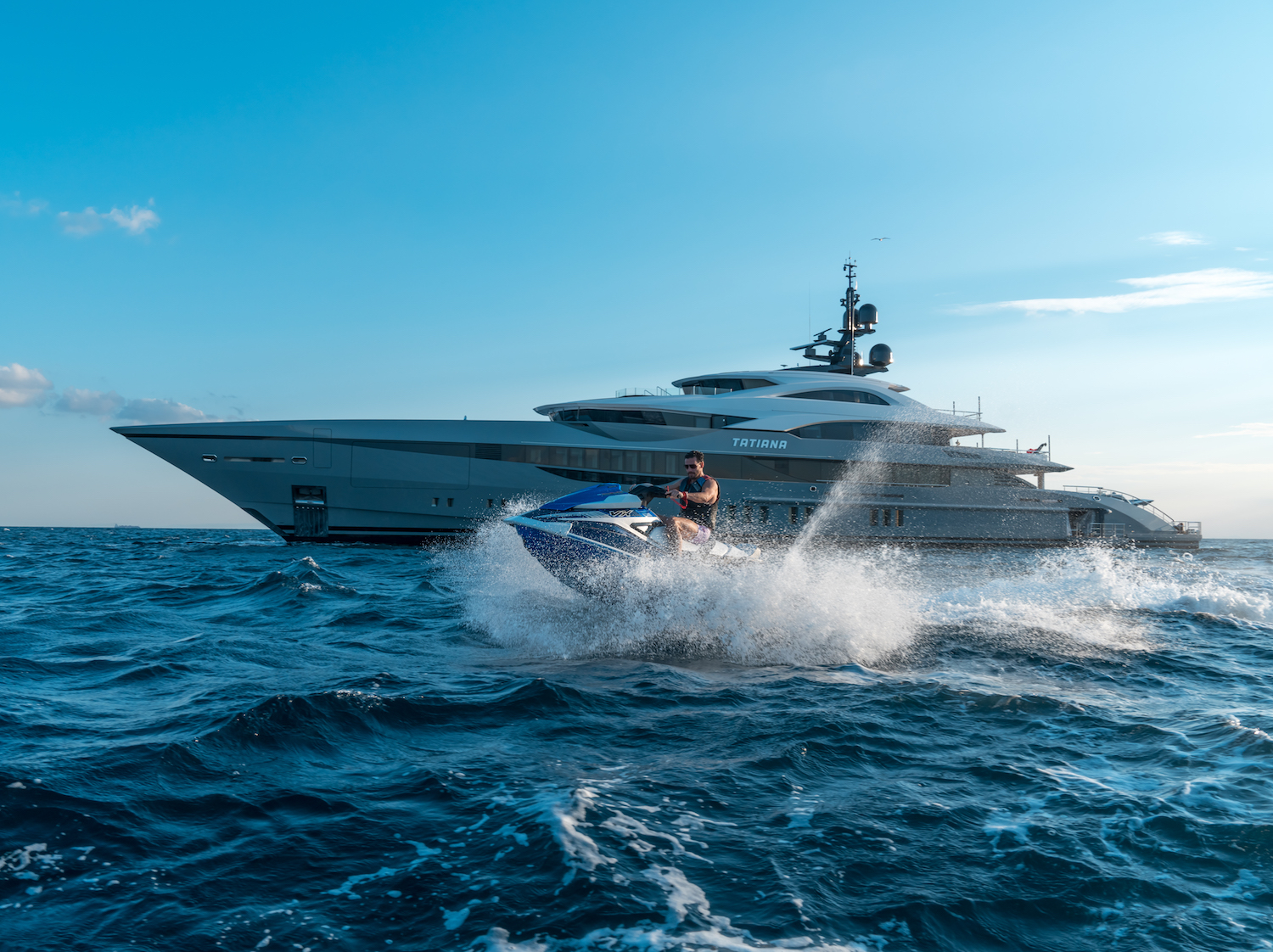 jetski running next to the superyacht.jpg