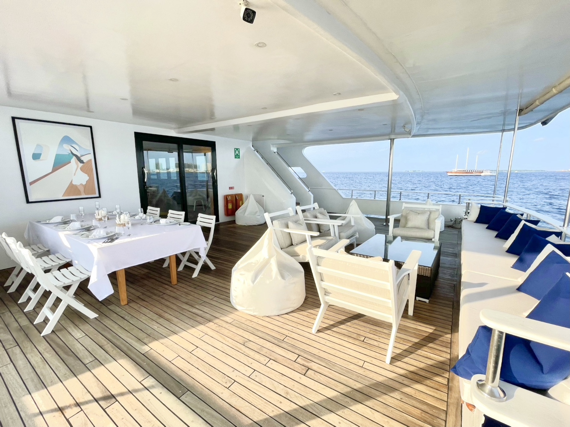main deck aft with dining set up.jpg